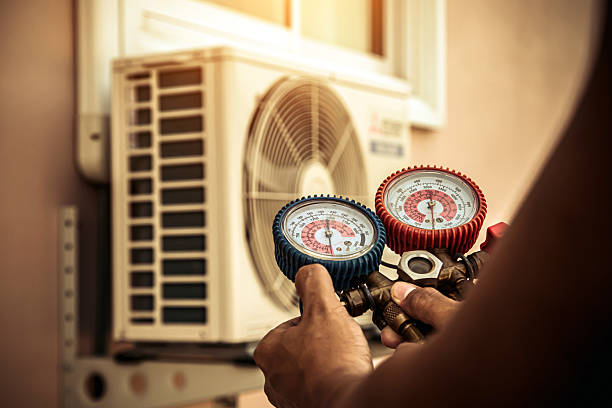 Professional Ac Installation technician working in Winfield, KS